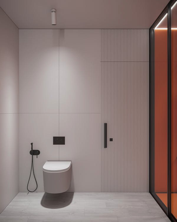 A new toilet in a residential bathroom.