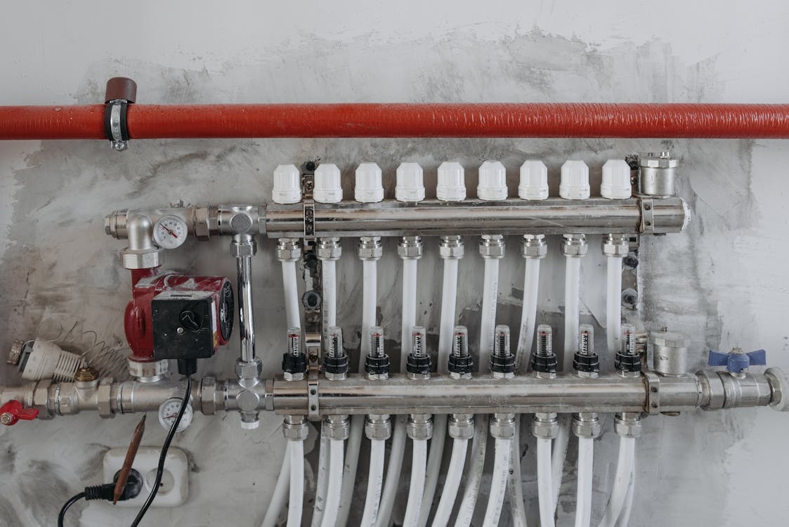 Underground steel heating and plumbing manifolds