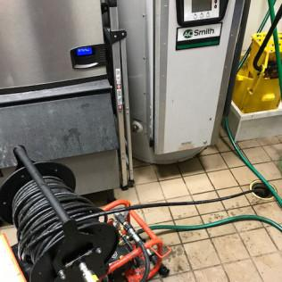Hydro jetting thoroughly cleans commercial kitchen sewer lines by removing grease, sludge, and debris.