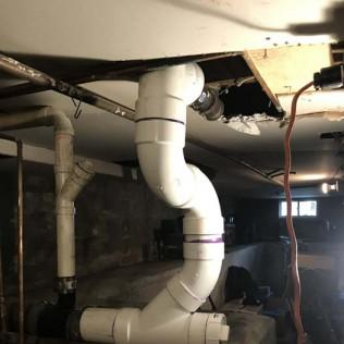 Modern plumbing installations in utility rooms provide dependable water service for all appliances and fixtures.