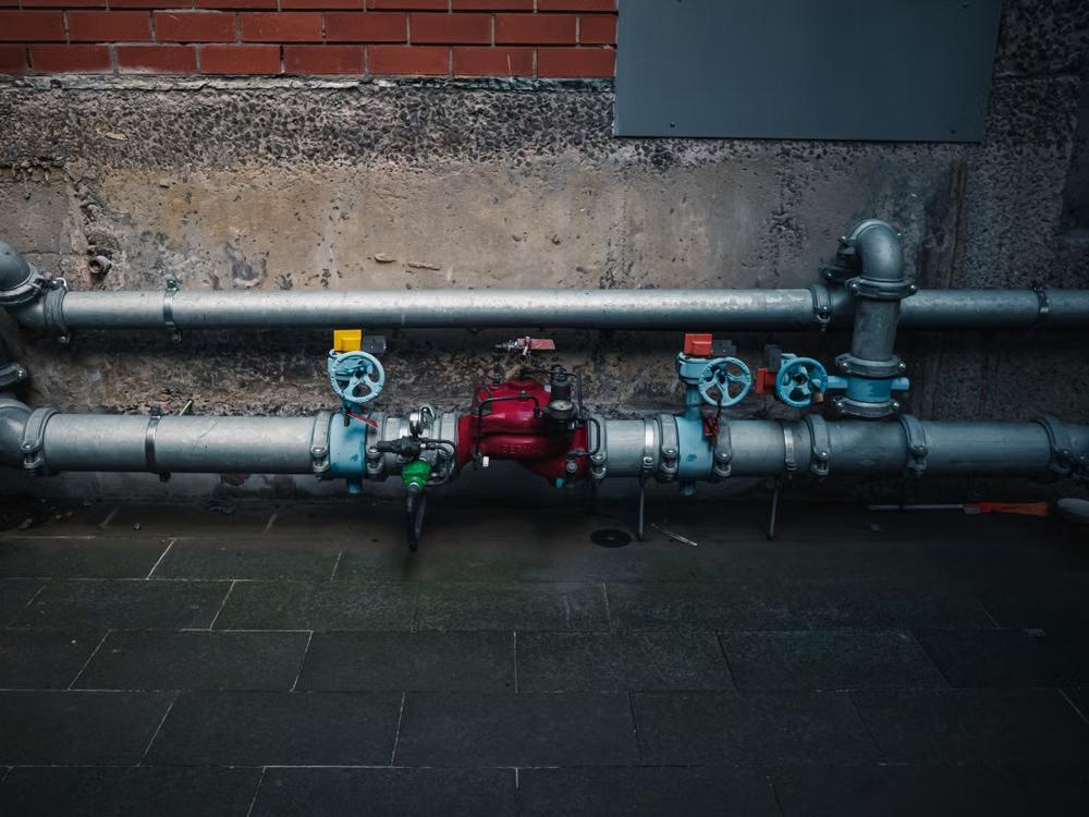 Outdoor plumbing pipes help carry and manage water around the home